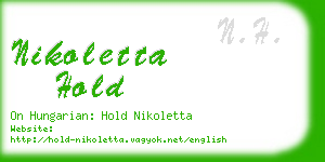 nikoletta hold business card